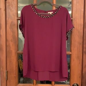 Blouse with beaded neck and arm detail